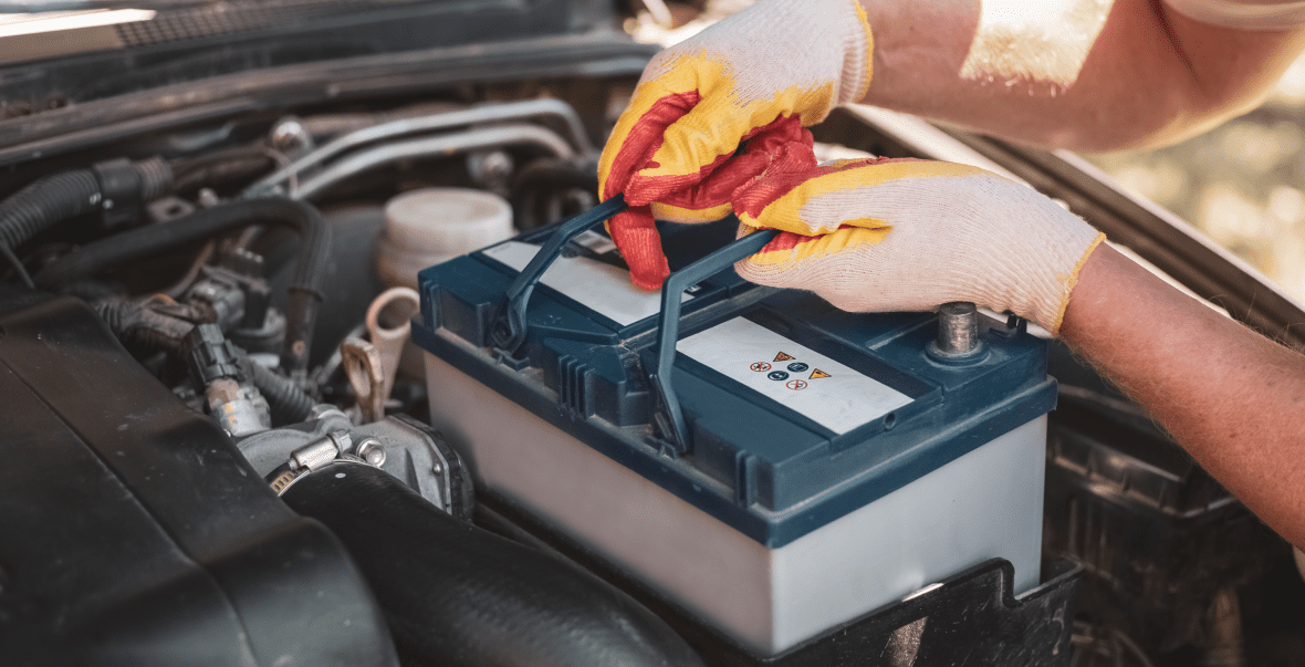 Installing a vehicle battery under the hood